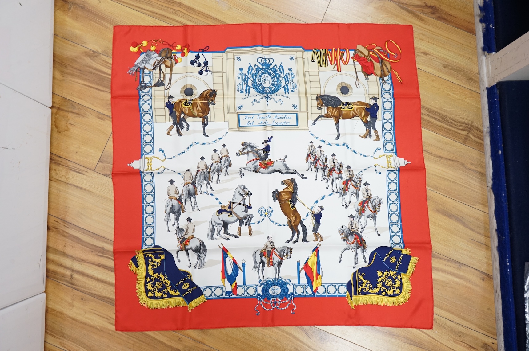 Two boxed Hermes silk scarves comprising ‘Real Escuela Andaluza del Arte Equestre’ and ‘Equateur’, with original boxes, together with four Hermes gentleman’s silk ties